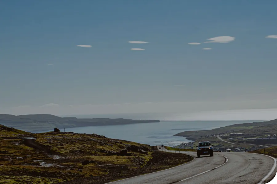 Car driving on a coastal road