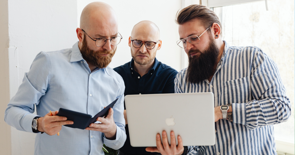 coworkers looking at computer