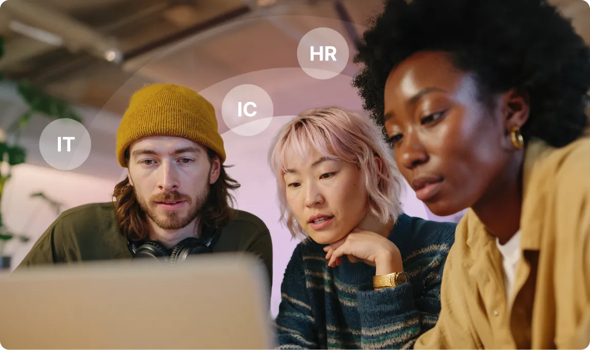 Three people focus on a laptop screen, with floating labels "IT," "IC," and "HR" above them, suggesting a collaborative work setting.