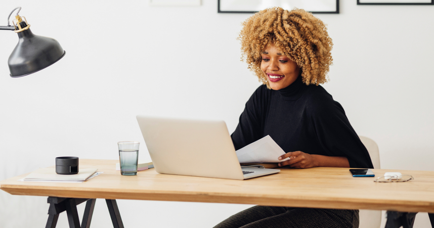 Woman at computer and image of Employee Profile example