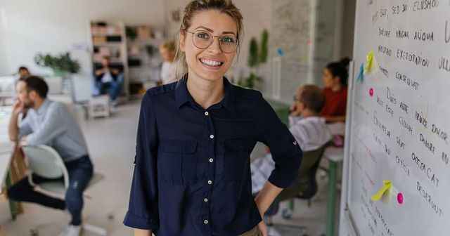 A woman working in employee experience management