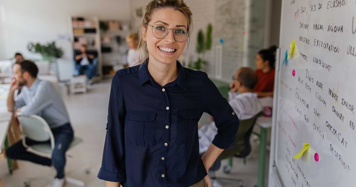 A woman working in employee experience management