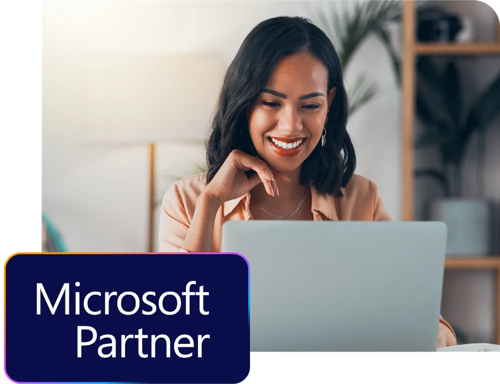 Smiling woman using a laptop, with a "Microsoft Partner" logo in the corner.
