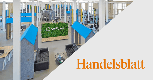Modern office space with blue partitions, lounge area, and "Staffbase" logo on a green wall; "Handelsblatt" text overlay.