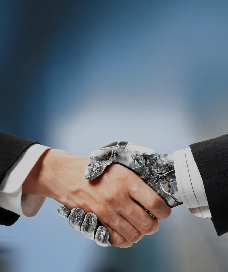 Human hand shaking a robotic hand