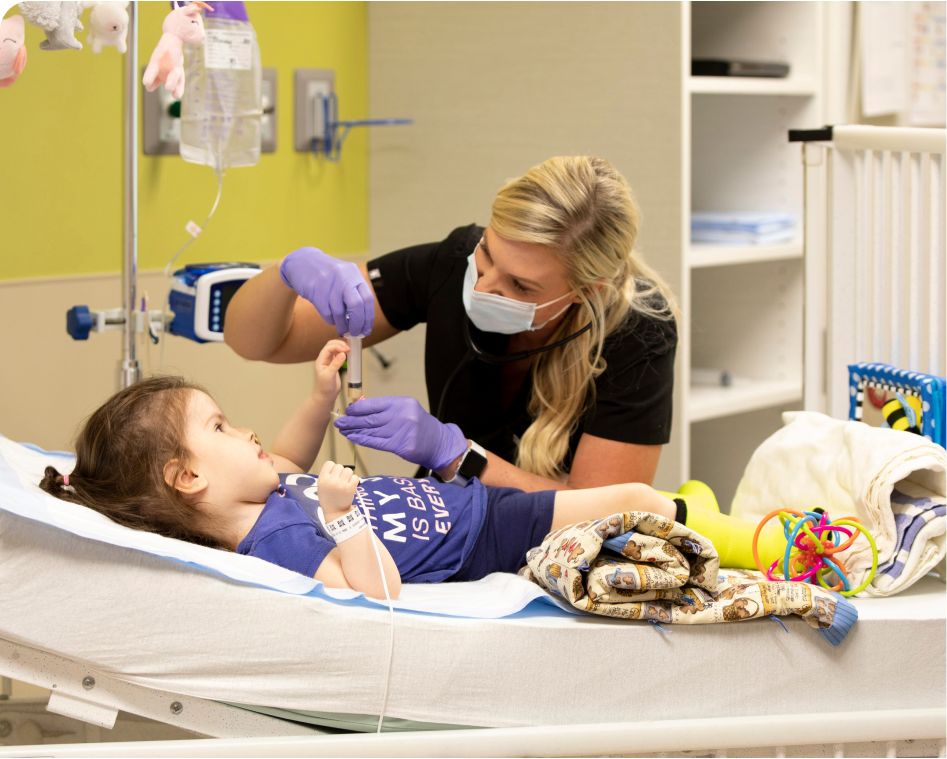Bethany Children's Healthcase Center nurse with patient