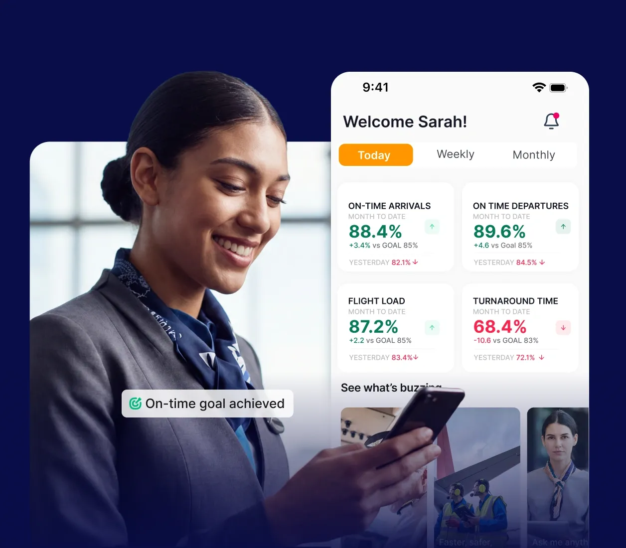 Smiling airline employee checks flight stats on a phone app, displaying on-time performance and other key metrics.