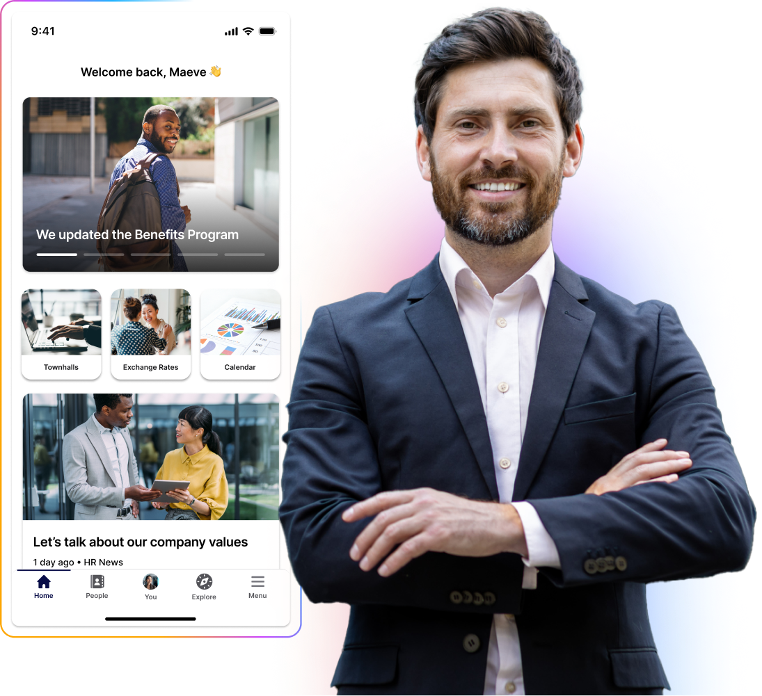 Smiling man in a suit stands with arms crossed beside a smartphone displaying a company app interface.