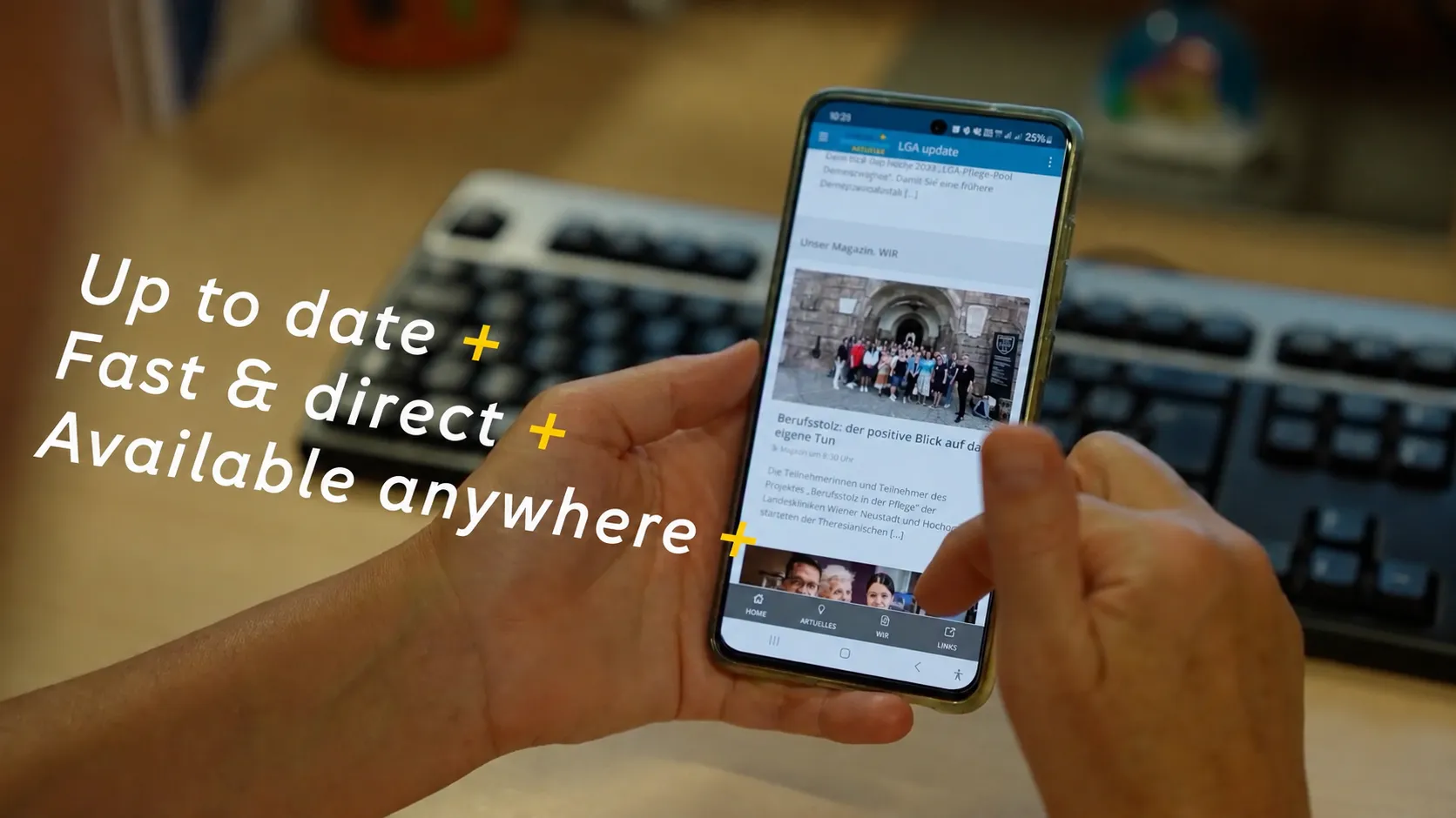 Hand holding a smartphone displaying a Staffbase employee app news feed, with overlay text "Up to date, fast & direct, available anywhere