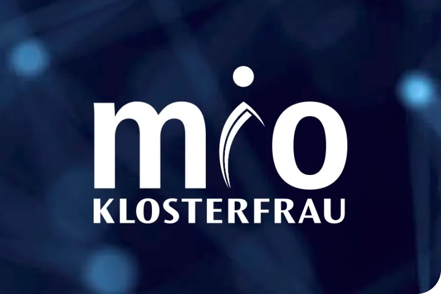 Logo with the text "mio KLOSTERFRAU" in white on a dark blue abstract background.