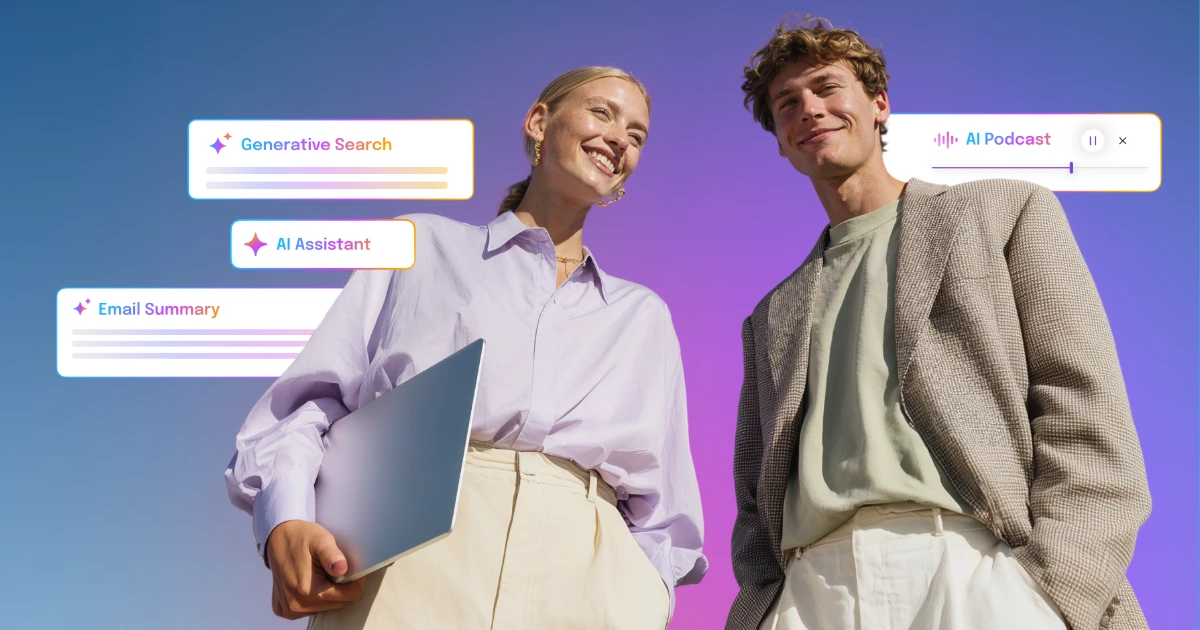 two people in workplace attire smiling