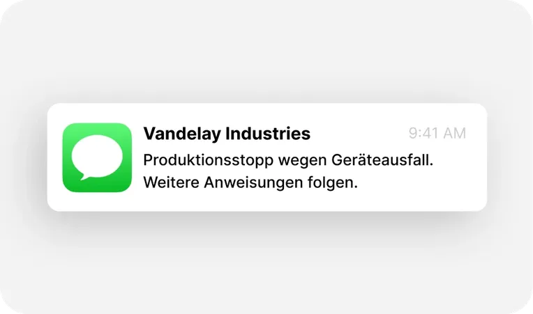 SMS-Benachrichtigung von Vandelay Industries über einen Produktionsausfall aufgrund eines Gerätefehlers, gesendet um 9:41 Uhr.