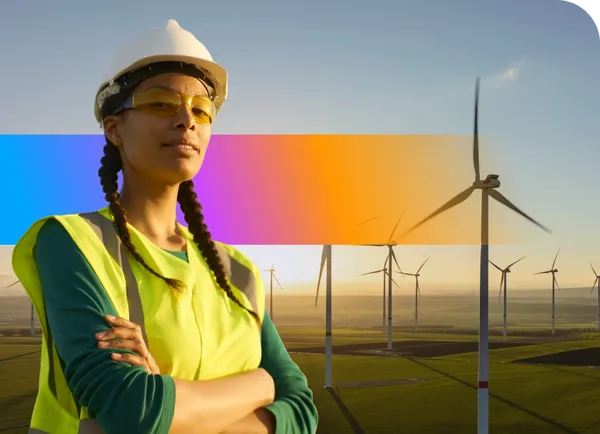 Woman in safety gear stands confidently in front of wind turbines, with a colorful gradient overlay in the background.