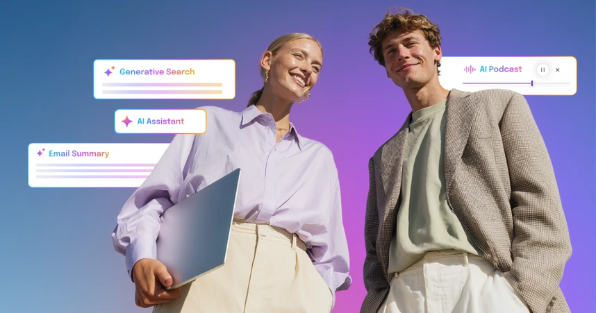 two people in workplace attire smiling