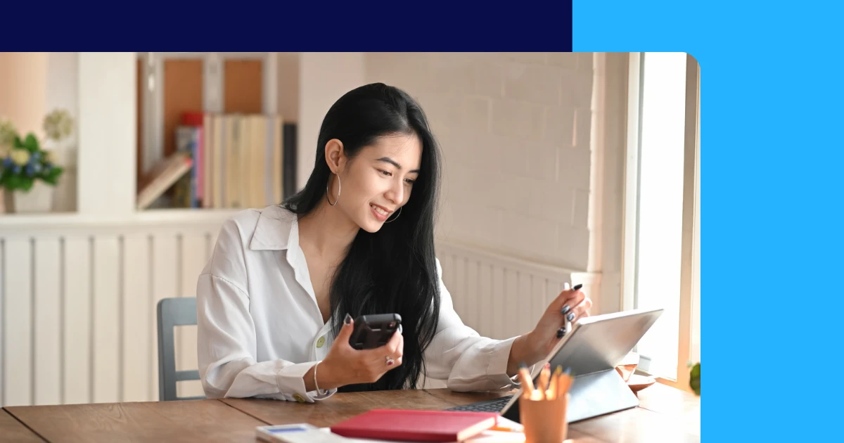Internal communications email image depicting a smiling woman reading on a tablet
