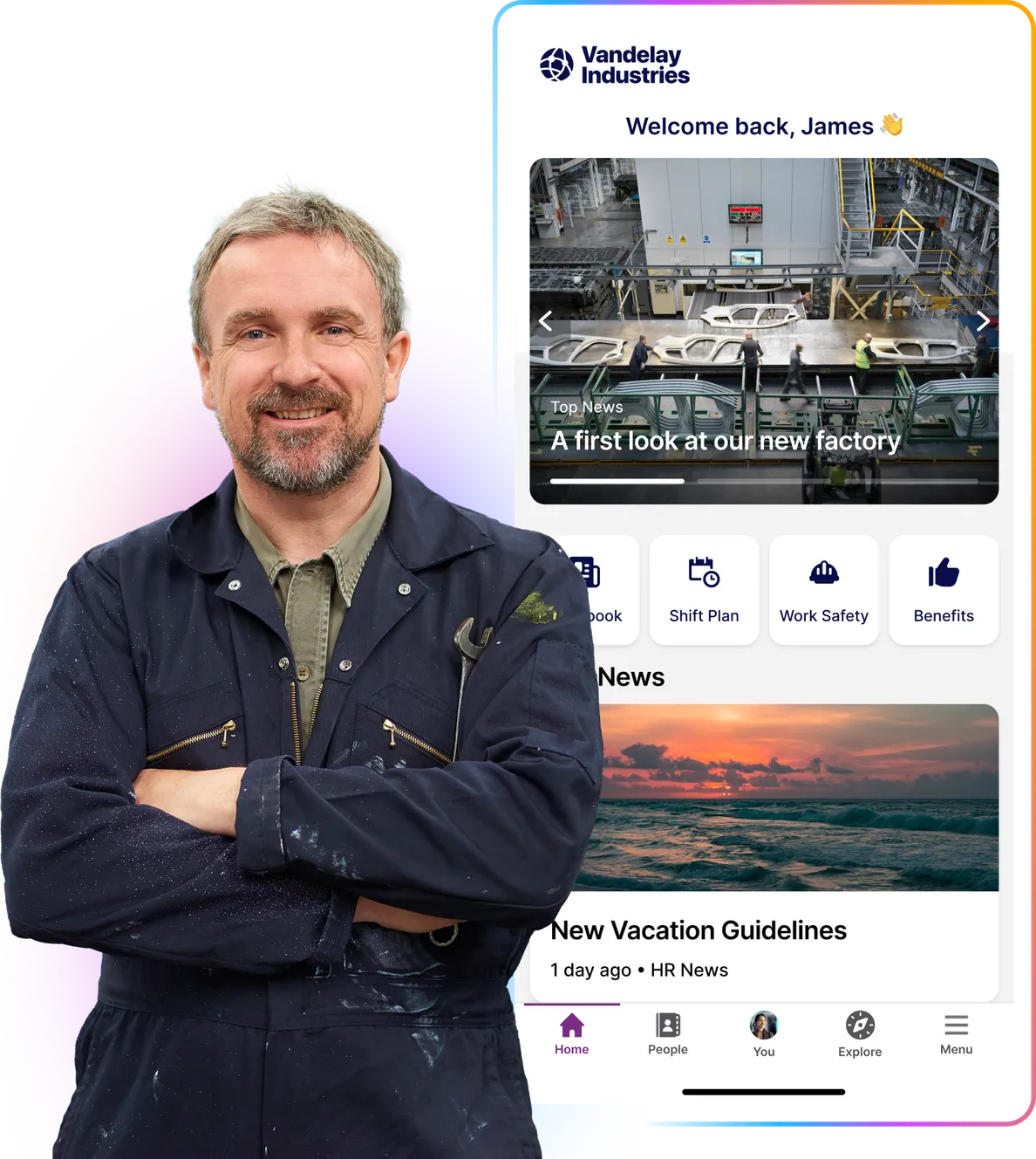 Smiling person in a work uniform stands in front of a digital display showing a company app interface with news and updates.