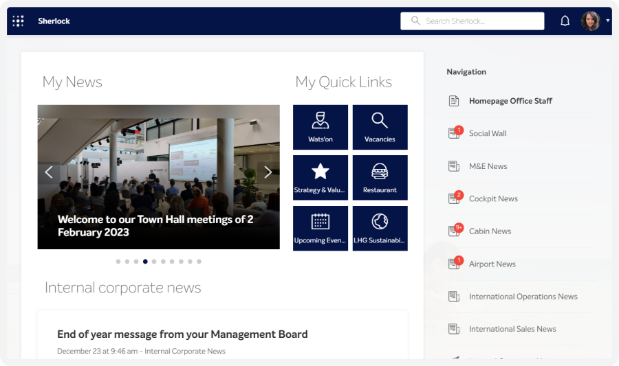 Dashboard interface showing a news section, quick links, and navigation menu. A highlighted event is a Town Hall meeting on February 2, 2023.