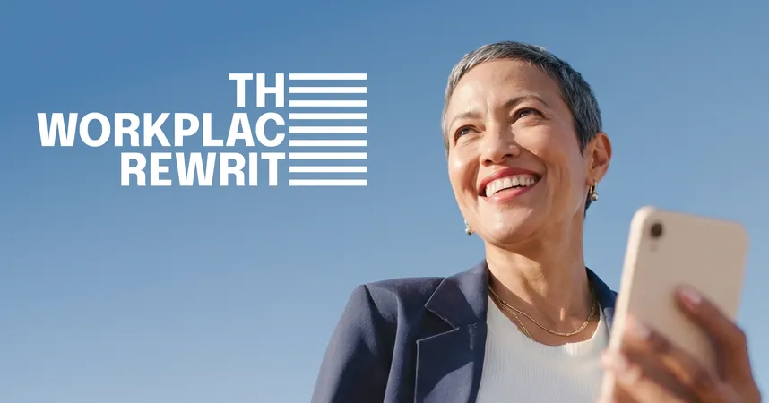The Workplace Rewrite logo next to a smiling woman with short gray hair in a navy blazer, holding a smartphone against a clear blue sky