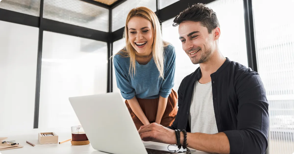 woman and man smiling