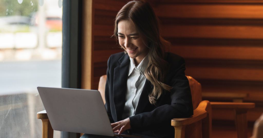 Creating an Engaging Employee Profile image of woman with laptop