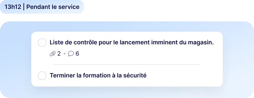 Interface de tâches Staffbase à 13h12 pendant le service, affichant deux tâches assignées : une liste de contrôle pour le lancement d'un magasin avec 2 pièces jointes et 6 commentaires, et une formation à la sécurité à compléter