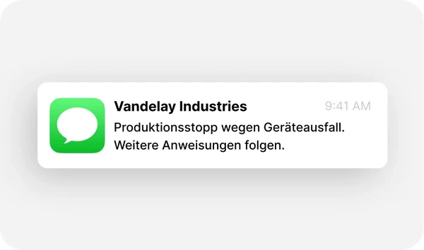 SMS-Benachrichtigung von Vandelay Industries über einen Produktionsausfall aufgrund eines Gerätefehlers, gesendet um 9:41 Uhr.