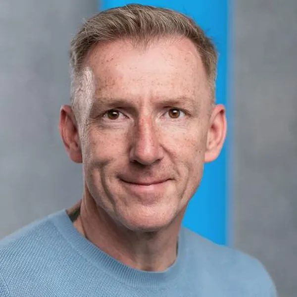 Marko Mueller man in blue sweater