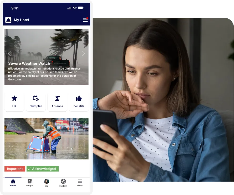 Woman using a smartphone app displaying a severe weather alert, with icons for HR, shift plan, absence, and benefits visible.