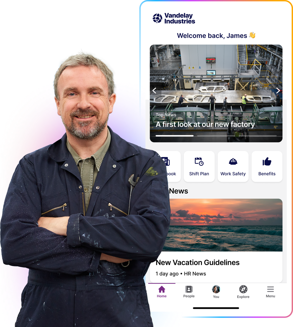 Smiling person in a work uniform stands in front of a digital display showing a company app interface with news and updates.